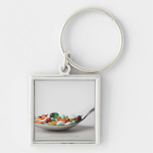 Sluiting van pillen in een lepel sleutelhanger
