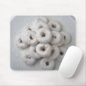 Sluiting van poederdonuts in een bord muismat (Met muis)