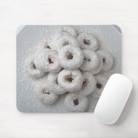 Sluiting van poederdonuts in een bord muismat (Met muis)