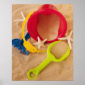 Sluiting van speelgoed op zand poster (Voorkant)