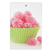 Smaak van frambozenachtige snoepjes in groene beke mini klembord (Achterkant)