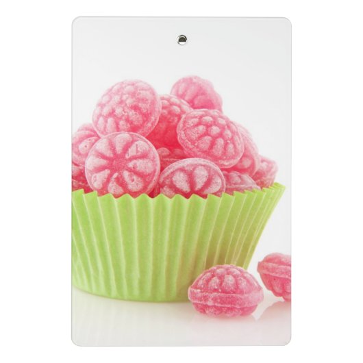 Smaak van frambozenachtige snoepjes in groene beke mini klembord (Achterkant)