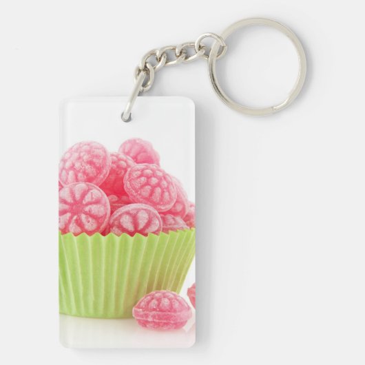 Smaak van frambozenachtige snoepjes in groene beke sleutelhanger (achterkant)