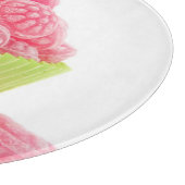 Smaak van frambozenachtige snoepjes in groene beke snijplank (Hoek)