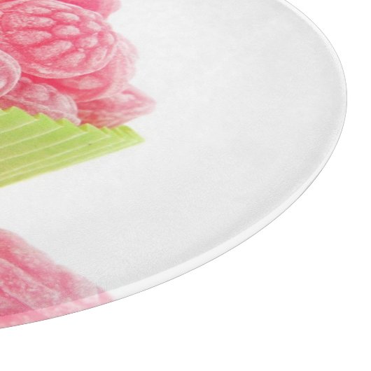 Smaak van frambozenachtige snoepjes in groene beke snijplank (Hoek)