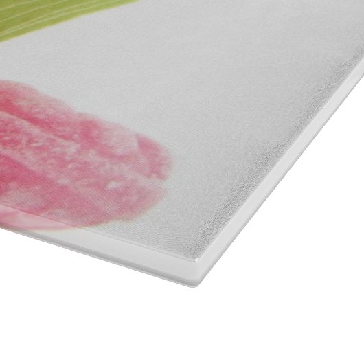 Smaak van frambozenachtige snoepjes in groene beke snijplank (Hoek)