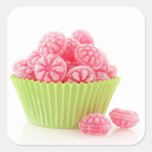 Smaak van frambozenlekkend snoep in groene beker vierkante sticker (Voorkant)