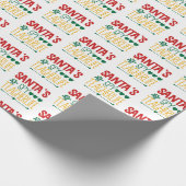 Smakelijke kerstman met spion cadeaupapier (Hoek)