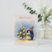 Small penguin decorates tiny Christmas tree, Feestdagenkaart (Staand voorkant)