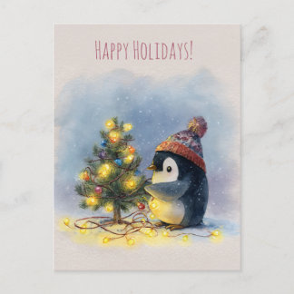 Small penguin decorates tiny Christmas tree, Feestdagenkaart