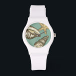 Small Shell Trio op Blauwgroen Horloge<br><div class="desc">Megan Meagher staat bekend om haar eenvoudige kunstwerken. Dit afbeelding geeft de eenvoud weer van de schatten van de zee,  van een kegel en een zeester. Meagher heeft een blauwgroen achtergrond in haar afbeelding om deze schatten te vergelijken. Profiteer vandaag nog van deze fijne kunst op uw Zazzle-product.</div>