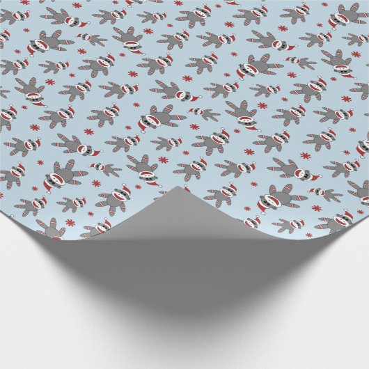 Small Sock Monkey With Santa Hat Blue Christmas Cadeaupapier (Hoek)