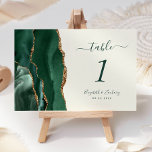 Smaragd Groen Goud Agaat Ivoor Bruiloft Kaart<br><div class="desc">De linkerkant van deze elegante moderne trouwtafel nummerkaart heeft een smaragdgroene waterverf agaatrand afgewerkt met faux gouden glitter. De aanpasbare tekst combineert groene handschriften,  cursief en koperplaat lettertypen op een ivoren achtergrond.</div>