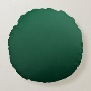 Smaragdgroene tinten rond kussen