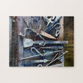Smeedgereedschap op tafel legpuzzel (Horizontaal)
