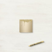 Smeltende gouden glitter post-it® notes (Op bureau)