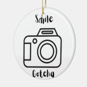 Smile Gotcha met camera op een Keramisch Ornament (Links)
