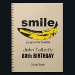 Smile is goed voor Health 80th Birthday Guestbook  Notitieboek<br><div class="desc">Grafische kunst: Banaan, georiënteerd op een glimlach kleine tekst tussen haakjes: (is goed voor de gezondheid). Ideaal voor iedereen die jaar na jaar blijft glimlachen. Ontwerp op spiraalvormig notitieboek als gastenboek met teksten voor de 80e verjaardag partij om aan te passen. U kunt tekst (doopvont, kleur, grootte en positie) gemakkelijk...</div>