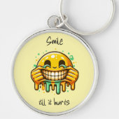 smile till it hurts sleutelhanger (Voorkant)