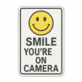 Smile You're on Camera Sign Sticker (Voorkant)