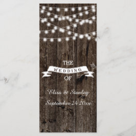 Snaar van lichten op oud houten huwelijksprogramma programmakaart