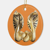 Snake houdt van kerstversieringen. keramisch ornament (Links)