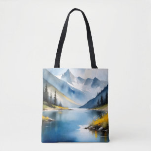Sneeuw bedekte bergen en een meer tote bag