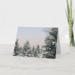 Sneeuw bedekte pijnbomen maan zonsondergang kaart