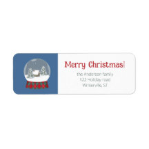 Sneeuw wereldbol met klein huis -