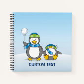 Sneeuwballende pinguïns notitieboek (Voorkant)