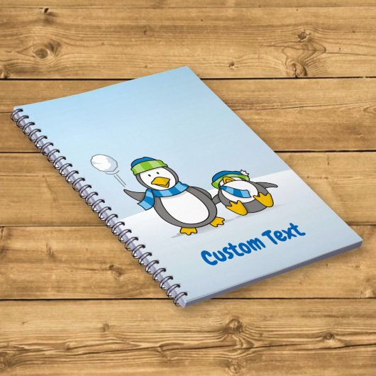 Sneeuwballende pinguïns notitieboek
