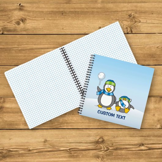 Sneeuwballende pinguïns notitieboek