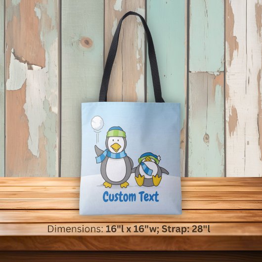 Sneeuwballende pinguïns tote bag