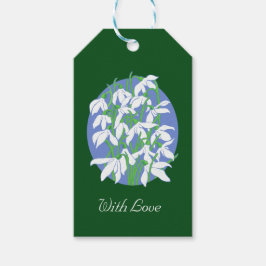 Sneeuwdruppels op zachte blauwe ovale achtergrond  cadeaulabel