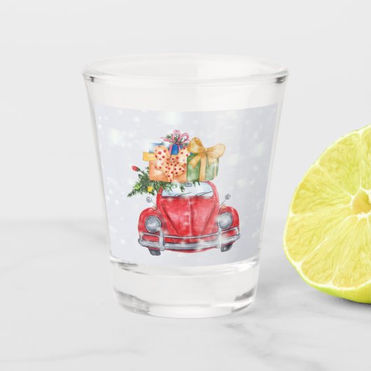 Sneeuwende kerstcadeautjes met rode auto's en bome shot glas (Voorkant)