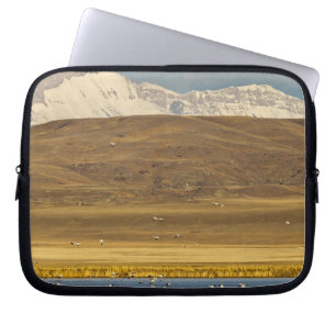 Sneeuwganzen tijdens de voorjaarstrek laptop sleeve