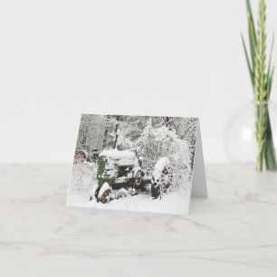 Sneeuwgedekte trekker feestdagen kaart