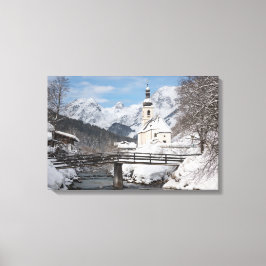 Sneeuwkerk met Alpenbergen in de winter Canvas Afdruk