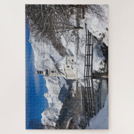 Sneeuwkerk met alpenbergen legpuzzel