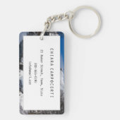 Sneeuwkerk met alpenbergen sleutelhanger (achterkant)