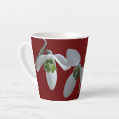 Sneeuwkraps. Donkere rode latte Mok (Linkerhoek)