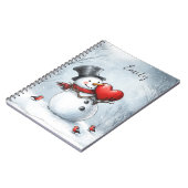 Sneeuwman biedt liefde met een groot hart notitieboek (Linkerzijde)