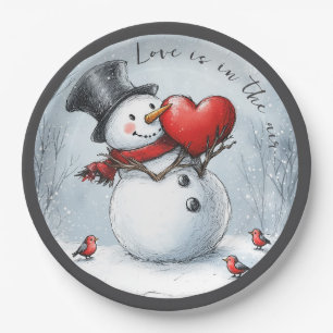 Sneeuwman biedt liefde met een groot hart papieren bordje