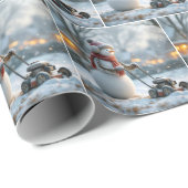 Sneeuwman duwt een retro grasmaaier op besneeuwd g cadeaupapier (Rol Hoek)