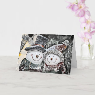 Sneeuwman en sneeuwvrouw die  Kaart tekent