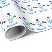 Sneeuwmannen die jongleren cadeaupapier (Rol Hoek)