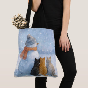 Sneeuwmannen en katten in een besneeuwd veld tote bag
