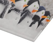 Sneeuwmannen sluiten op rij snijplank (Hoek)