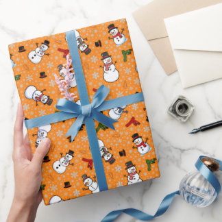 Sneeuwmannen & Sneeuwvlokken op Oranje Cadeaupapier