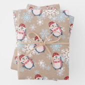 Sneeuwpinguïns met kraftkerst inpakpapier vel (In situ)